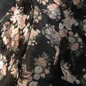 Sheer shortsleeve jacket with black tassels